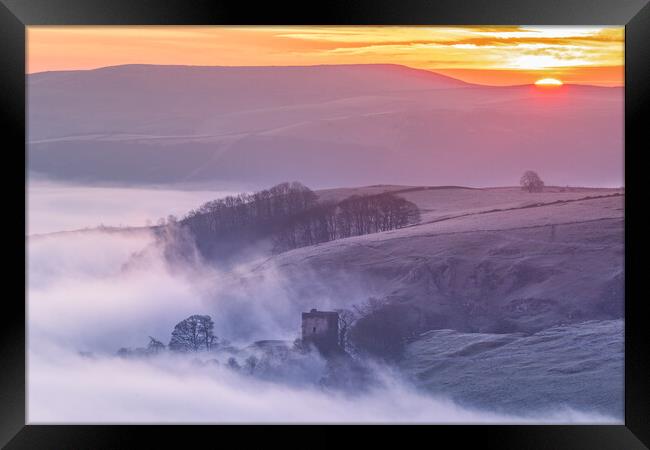 Peveril Castle at sunrise over fog. Peak District Framed Print by John Finney