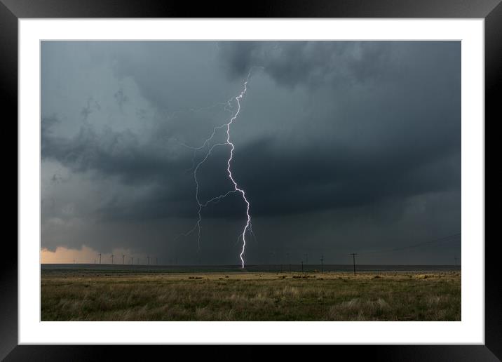 Lightning over a wind-farm in New Mexico. Framed Mounted Print by John Finney