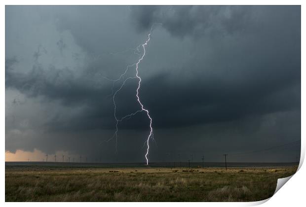 Lightning over a wind-farm in New Mexico. Print by John Finney