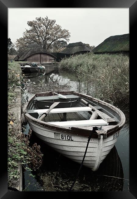Moored rowing boat Framed Print by Stephen Mole