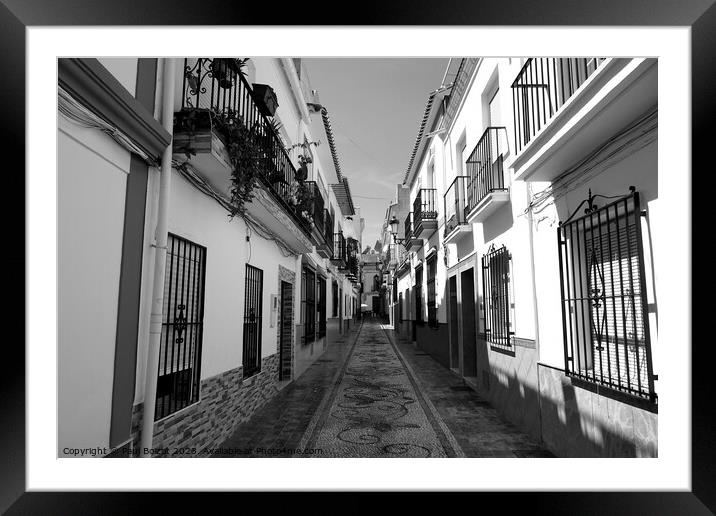Street in Nerja, Spain, monochrome Framed Mounted Print by Paul Boizot