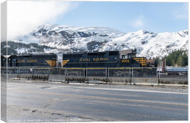 Alaska Railroad Locomotive 3001 with snow covered mountains behind, Whittier, Alaska, USA Canvas Print by Dave Collins