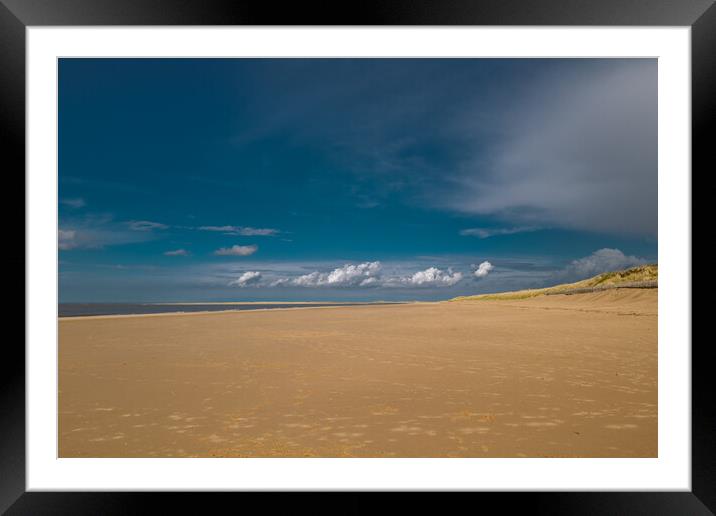 Brancaster beach on a beautiful sunny day. Framed Mounted Print by Bill Allsopp