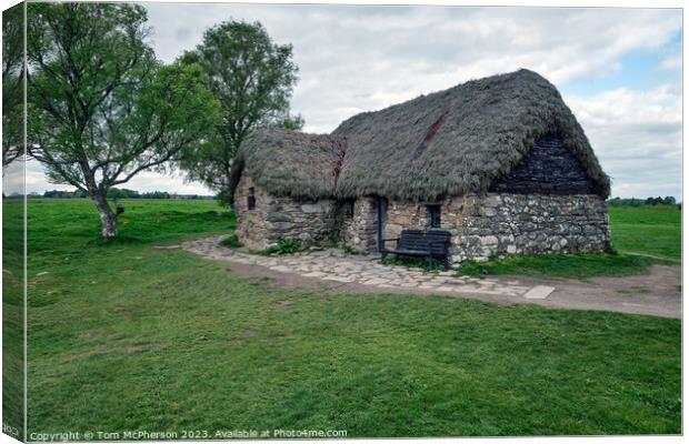 Echoes of History: Culloden's Leanach Cottage Canvas Print by Tom McPherson