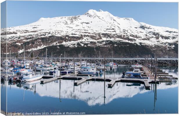 Snow covered mountain reflected in the calm waters of Whittier marina, Whittier, Alaska, USA Canvas Print by Dave Collins