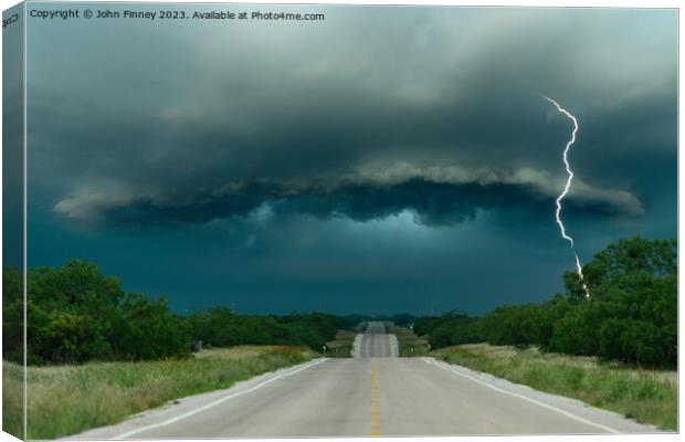 Supercell Road. Texas Canvas Print by John Finney