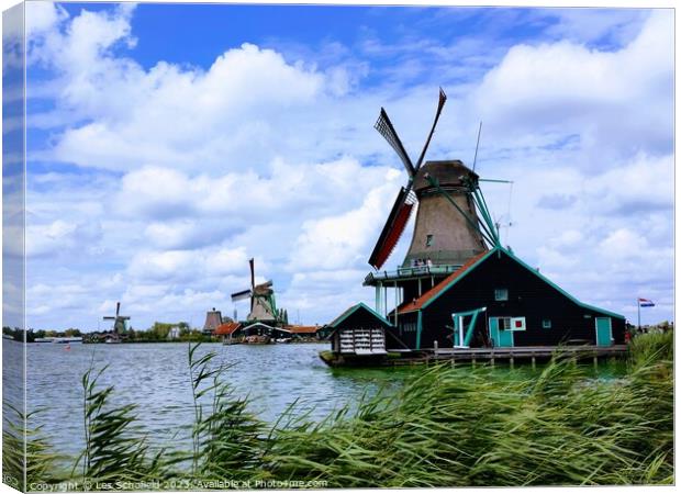 Windmill in zaanse Holland  Canvas Print by Les Schofield