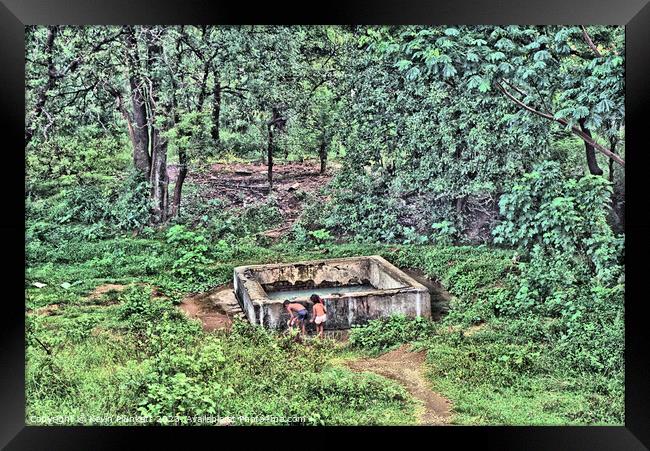 A water tank in a forest. Sri Lanka Framed Print by Kevin Plunkett