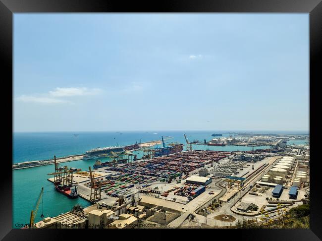 Aerial View of the industrial port of Barcelona on a sunny summer day. Framed Print by Michael Piepgras