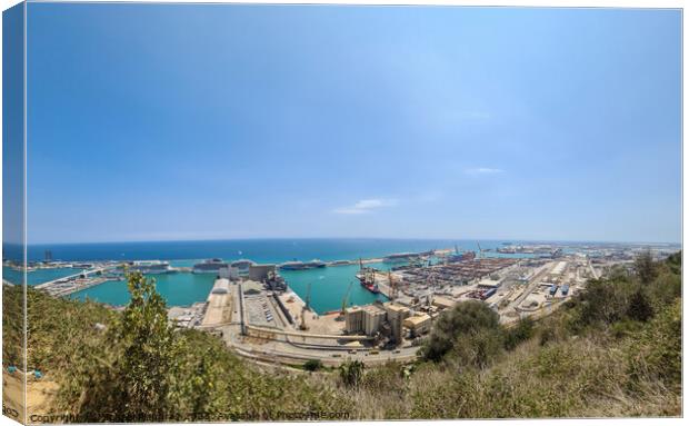Aerial View of the industrial port of Barcelona on a sunny summer day. Canvas Print by Michael Piepgras