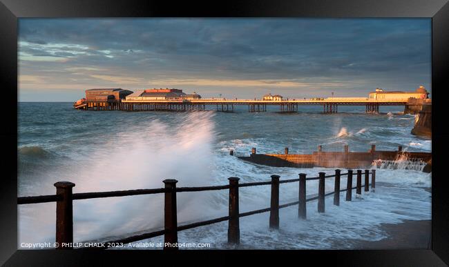Cromer pier sunset with crashing waves 917 Framed Print by PHILIP CHALK