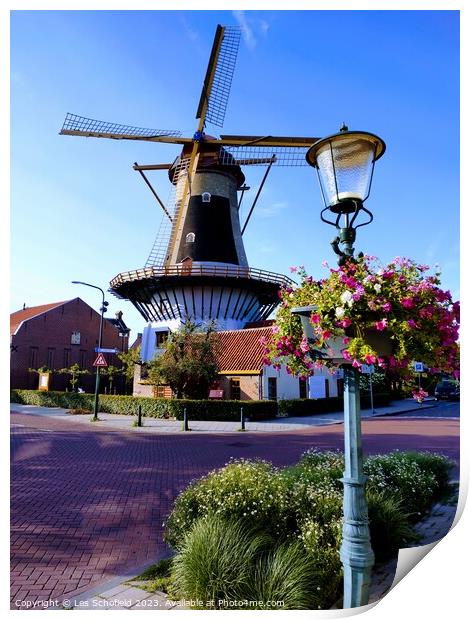 Windmill in wassaner Netherlands  Print by Les Schofield