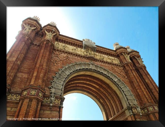Barcelona, Spain - 22 July 2023: The Arc de Triomf in Barcelona on a sunny day with some tourists Framed Print by Michael Piepgras