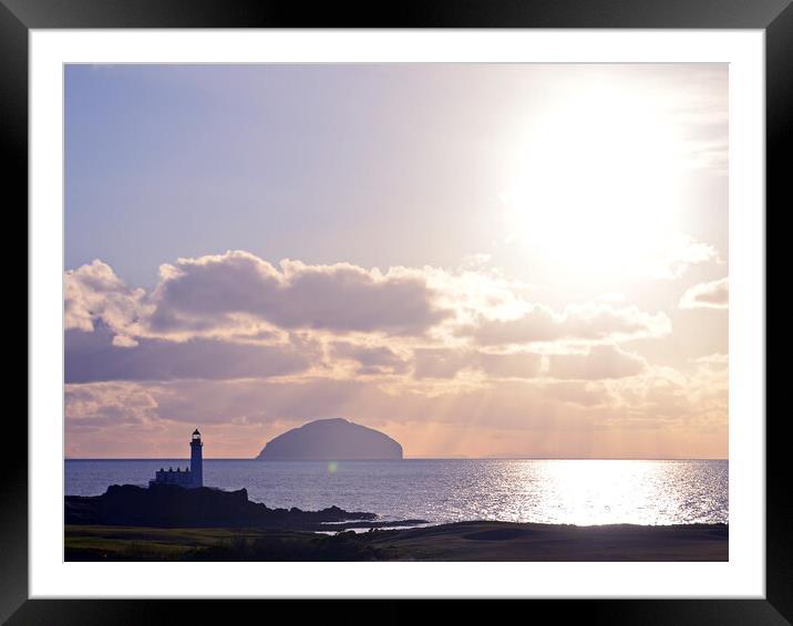 Turnberry lighthouse and Ailsa Craig as sun sets Framed Mounted Print by Allan Durward Photography