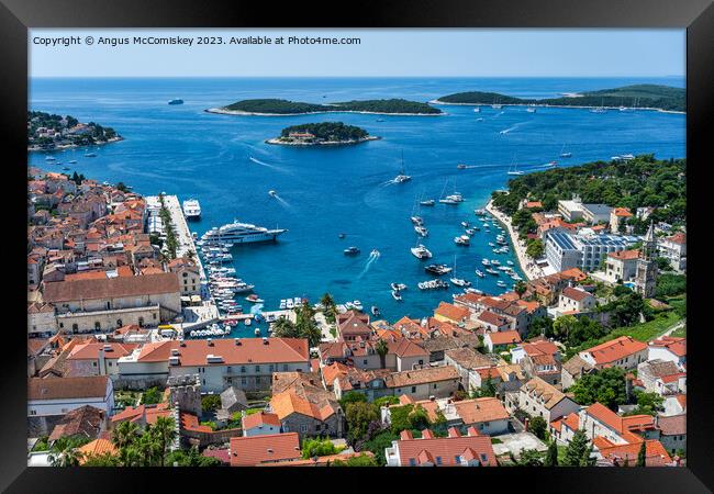 Aerial view of Hvar town and harbour, Croatia Framed Print by Angus McComiskey