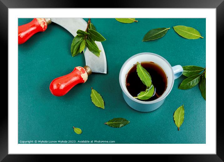 Cup of tea of bay leaf Framed Mounted Print by Mykola Lunov Mykola