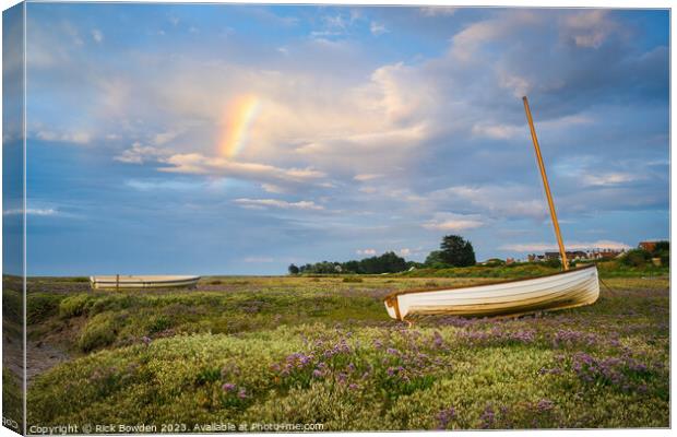'Rainbow's Embrace on Brancaster Boats' Canvas Print by Rick Bowden