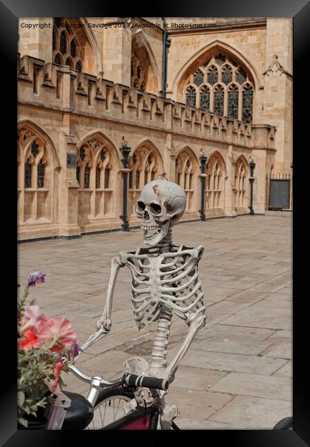 Skelton in front of Bath Abbey Framed Print by Duncan Savidge