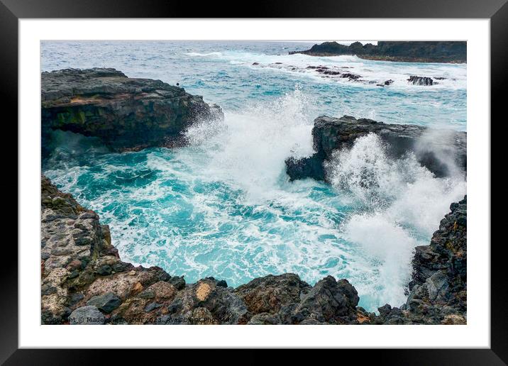 Large waves crash against the volcanic rock in La Palma Framed Mounted Print by Madeleine Deaton