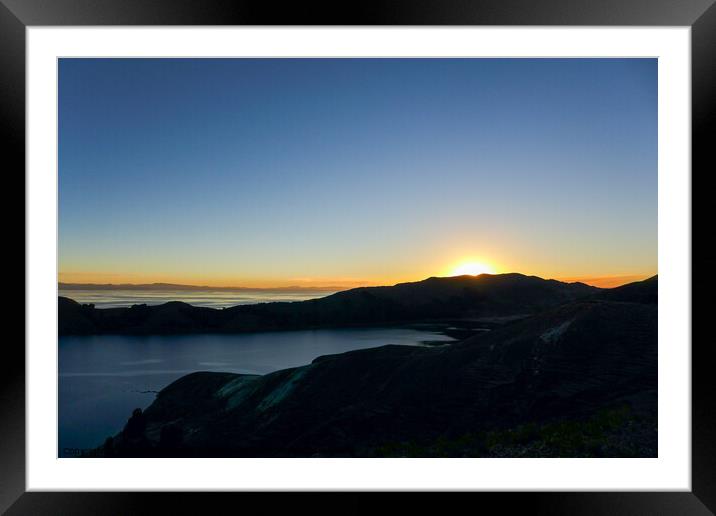 Isla del Sol sunset behind mountains on Lake Titicaca Framed Mounted Print by Madeleine Deaton