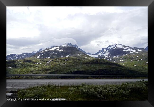 Norway's Soaring Sognefjellet Peaks Framed Print by john hill