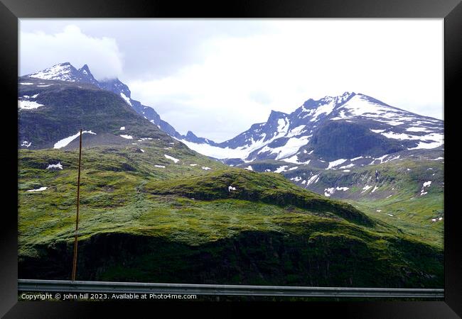 Norway's Snow-Kissed Sognefjellet Peaks Framed Print by john hill