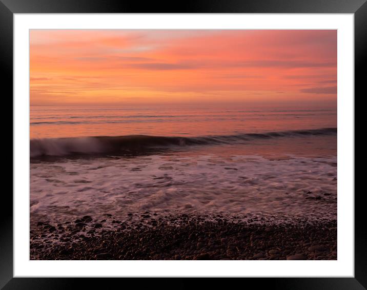 Sunset wave lapping the shoreline Framed Mounted Print by Tony Twyman