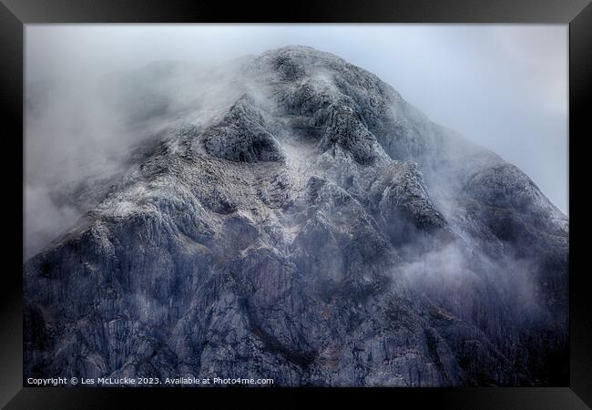 Outdoor mountain covered in snow and fog Framed Print by Les McLuckie
