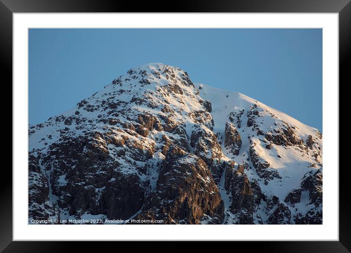 Outdoor mountain with sunlight hitting mid winter Framed Mounted Print by Les McLuckie