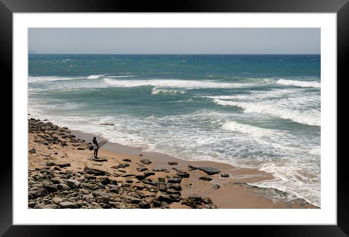Surfer with his surfboard standing at the beach Framed Mounted Print by Lensw0rld 