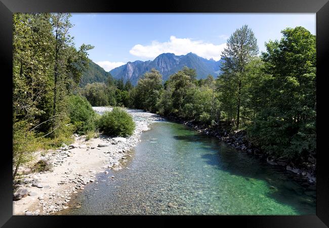 Flowing Skykomish river with cascade mountains  Framed Print by Thomas Baker