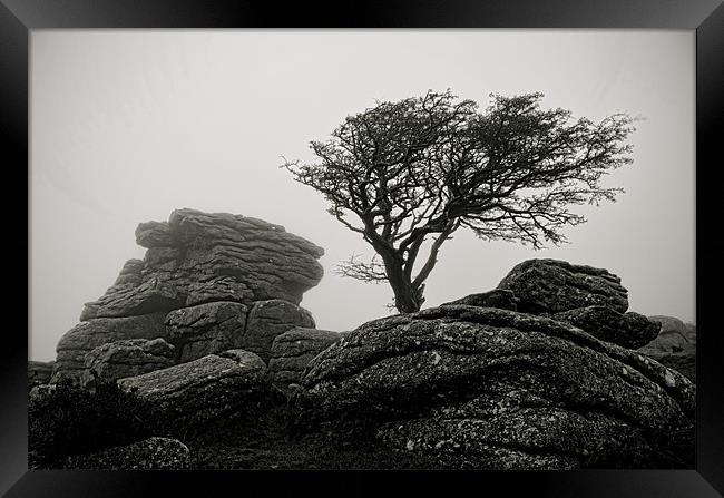 Holwell Tor in the Mist Framed Print by Pete Hemington