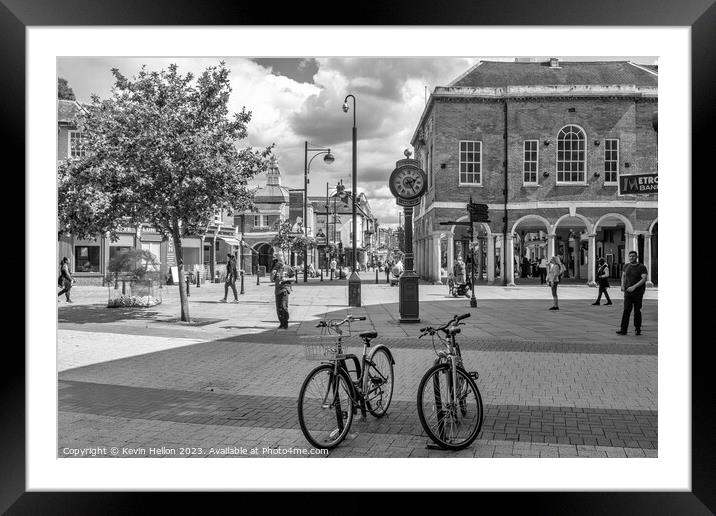 Bicycles in front of the Millenium clock, High Wycombe  Framed Mounted Print by Kevin Hellon