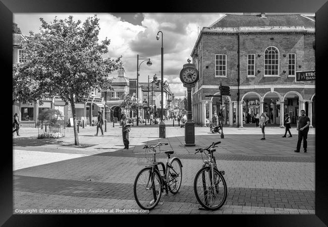 Bicycles in front of the Millenium clock, High Wycombe  Framed Print by Kevin Hellon