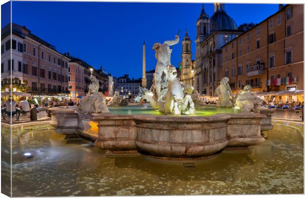 Fountain of Neptune at Night in Rome Canvas Print by Artur Bogacki