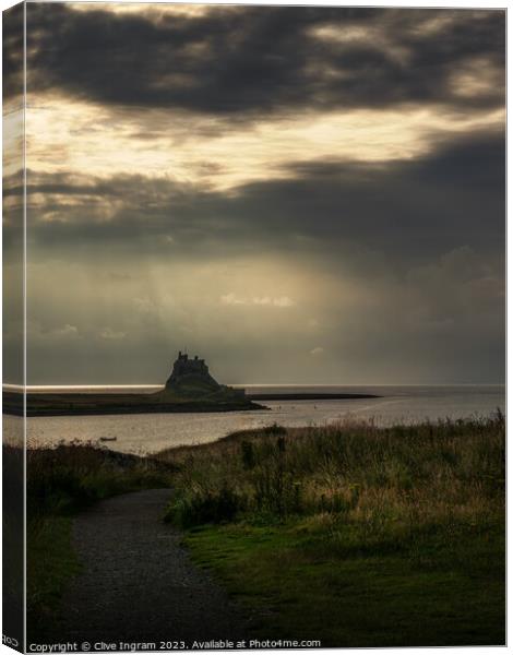 Light rays on LindisfarneCastle Canvas Print by Clive Ingram
