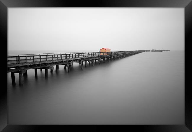 Pier with coloured shed Framed Print by Mark Harrop