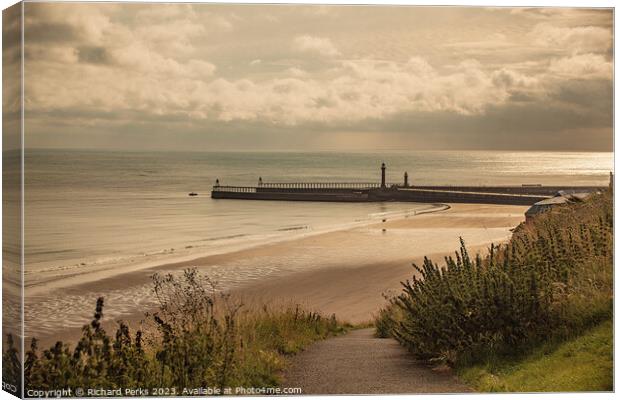 Whitby Piers Canvas Print by Richard Perks