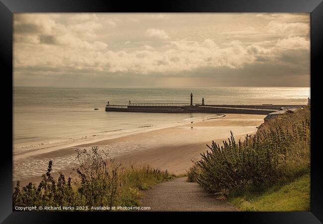 Whitby Piers Framed Print by Richard Perks