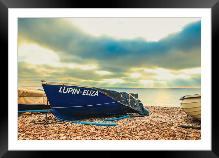 Boat on Budleigh Beach with Sun Rays Framed Mounted Print by Adrian Burgess