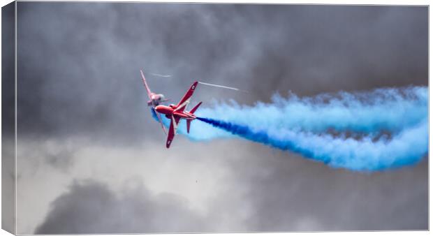 Red Arrows Cross Over Canvas Print by J Biggadike