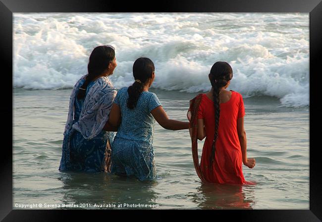 Indian Women in the Sea at Varkala Framed Print by Serena Bowles
