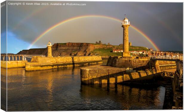 Rainbow's Embrace over Whitby Harbour Canvas Print by Kevin Elias
