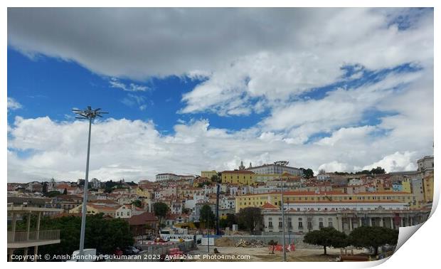 Lisbon cityscape featuring architecture, skyline, and cloudy sky. Print by Anish Punchayil Sukumaran