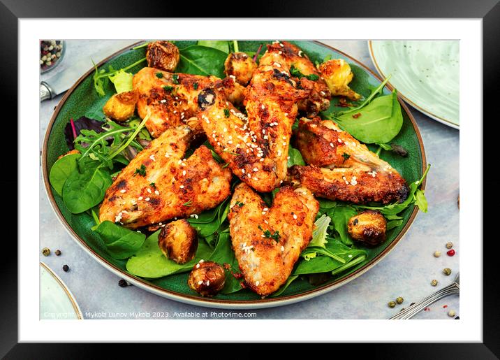 Grilled chicken wings on a plate Framed Mounted Print by Mykola Lunov Mykola
