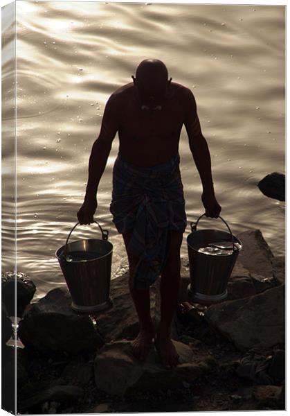 Collecting Water from the Ganges, Varanasi, India Canvas Print by Serena Bowles