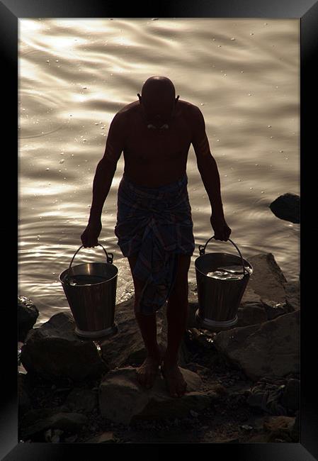 Collecting Water from the Ganges, Varanasi, India Framed Print by Serena Bowles