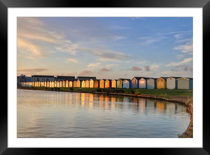 Sunrise reflections across the Brightlingsea Boating lake  Framed Mounted Print by Tony lopez
