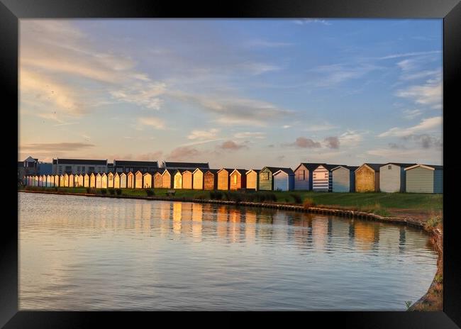 Sunrise reflections across the Brightlingsea Boating lake  Framed Print by Tony lopez