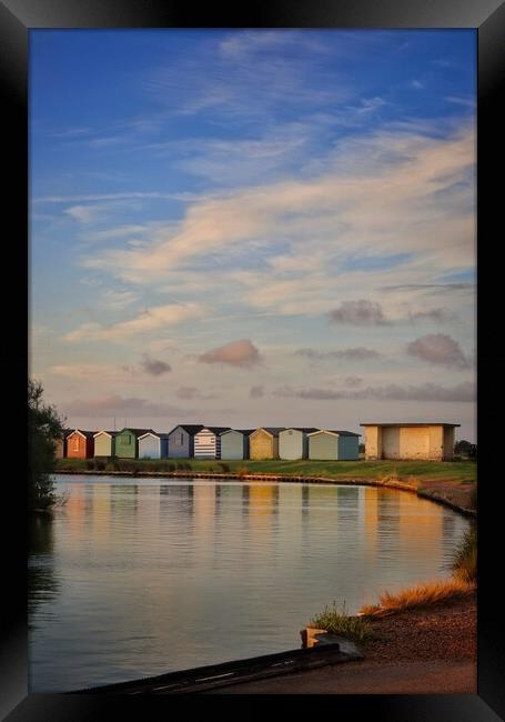 Sunrise over th beach huts around the Boating lake in Brightlingsea  Framed Print by Tony lopez